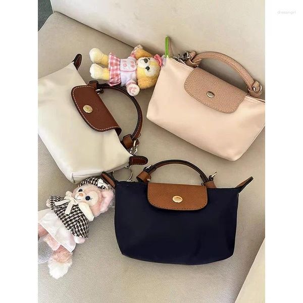 Bolsas de noite Mulheres Bolsa 2024 Mão de trompete pequena transportar corpo transversal portátil mini bolsa de moedas key celular feminino feminino