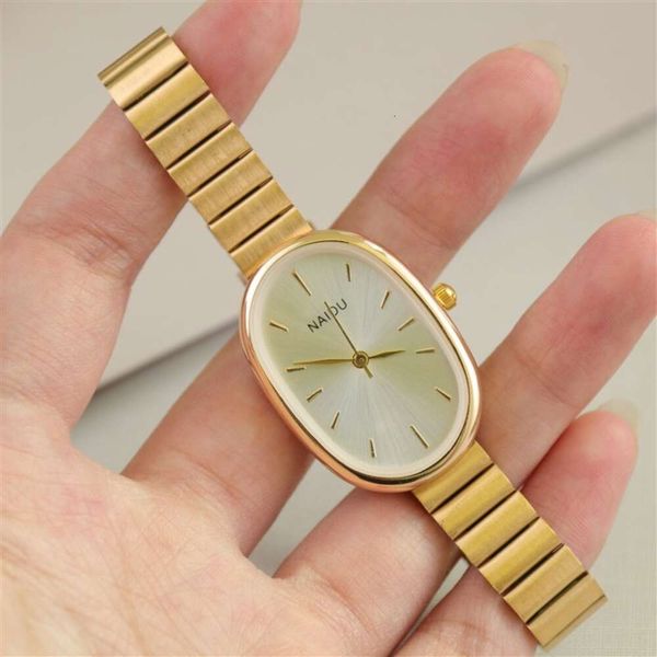 Vendita calda ovali bellissimi orologi da donna per donna ragazza semplici orologi da polso minimalisti al quarzo con cinturino in argento e lega d'oro