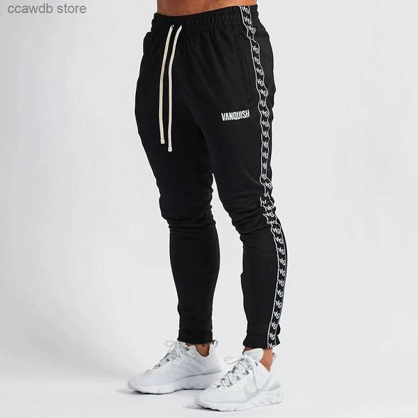 Pantaloni da uomo Pantaloni sportivi da fitness Pantaloni da allenamento sportivi da corsa larghi da uomo 2023 Tirare la corda Lettera Striscia di bordo T240108