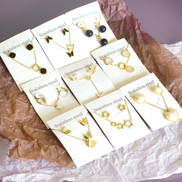 Marca barata de alta qualidade Dubai banhado a ouro pingente de aço inoxidável colar brincos conjunto de joias para mulheres