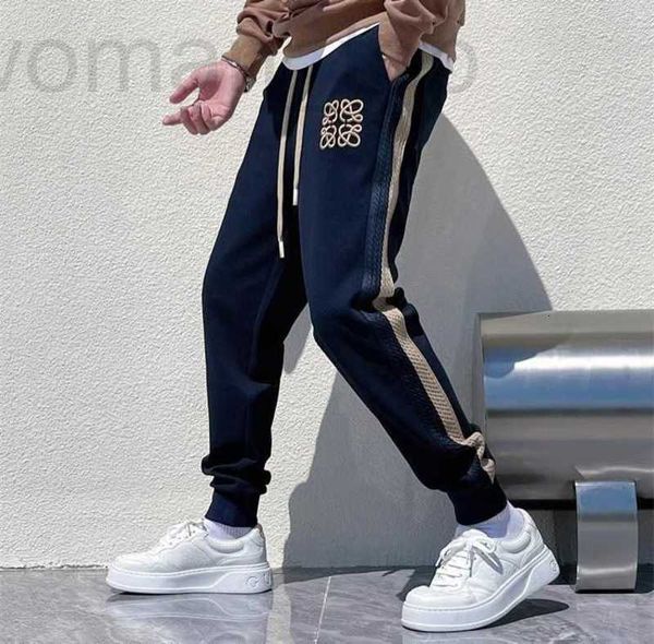 Pantaloni da uomo Designer Trendy Guardia ricamata per la primavera e l'autunno Nuove strisce laterali Cinturino versatile Sport Sciolto Casual Uomo lungo SKL8