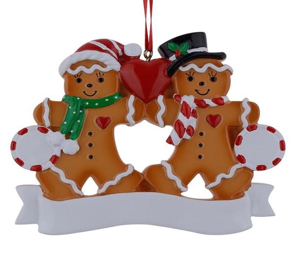 Maxora Resina Gingerbread Família de 2 enfeites de Natal com maçã vermelha como novidade personalizada para presentes para férias e casa De5389650