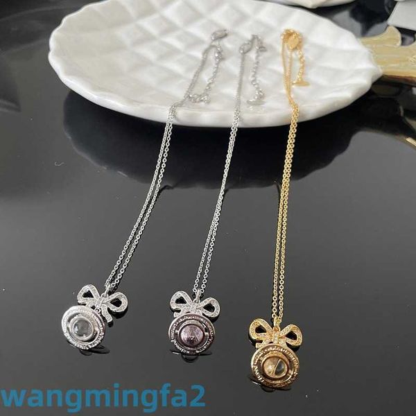 2024designer Western Empress Dowagernecklace New Fashion Girl Sweet Cool Bow 3d Saturn Collana di diamanti Catena maglione a strati in polvere d'oro e argento