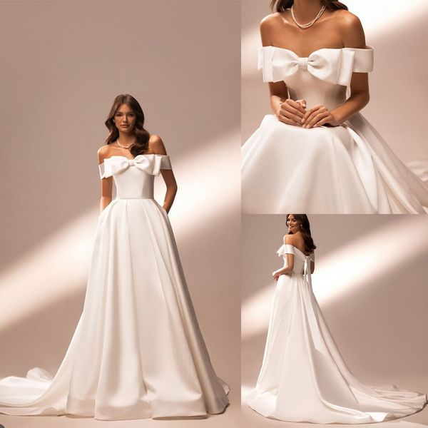 Einfaches, schulterfreies, weißes Hochzeitskleid aus Satin in A-Linie mit großer Schleife, maßgeschneiderte Brautkleider