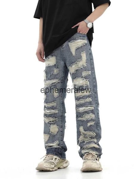 Jeans da uomo 2023 stile americano high street lavato personalizzato taglio buco strappato tubo dritto jeans larghi versatili per uomini e donne effimeri