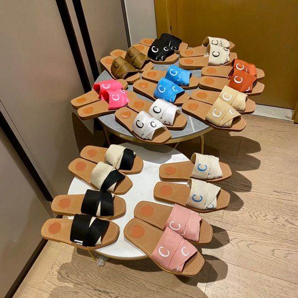 2024 yeni stil terlik odunsu düz katır dudak terlik sandal shoewomen tuval baskı işlemeli slaytflatlar sandaletler firmati baba ayakkabı balık ağız flip flops