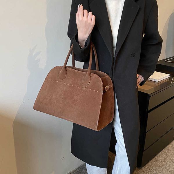 Therow Bag A Die mit der Reihe bester Qualität modischer Wildleder -Leder -Beutel -Sinn für Luxus große Kapazität tragbare Frauentasche Mode Pendler Aktentasche