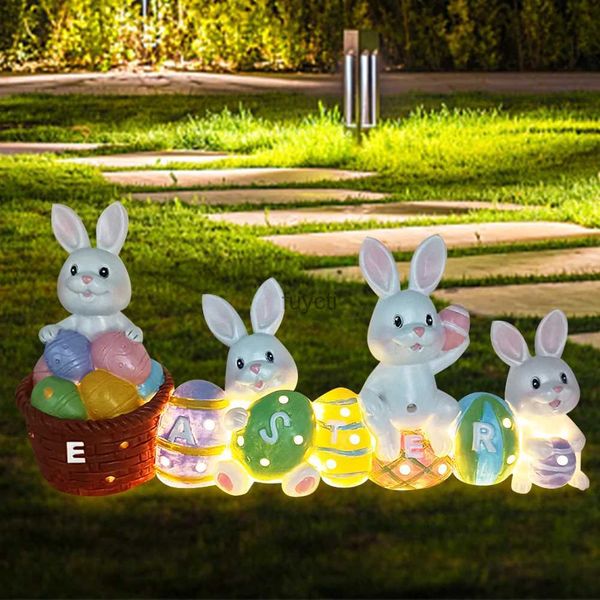 Altre forniture per feste per eventi Ornamenti per statue della famiglia del coniglietto pasquale con luce a LED Decorazione per conigli da tavolo Lampada decorativa per conigli in resina versatile YQ240116