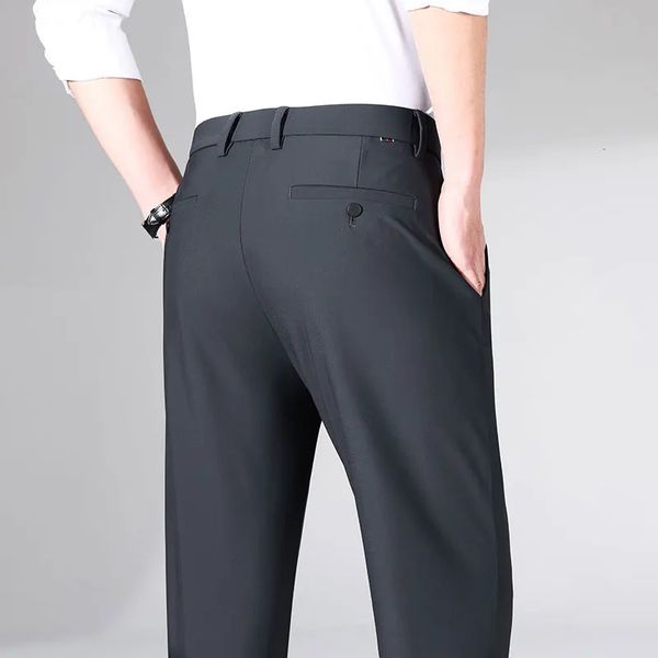 Primavera / Estate Pantaloni casual in seta di ghiaccio elastica su quattro lati Pantaloni a gamba dritta da uomo Business Leisure Jeans di marca di moda Abbigliamento da uomo 240115