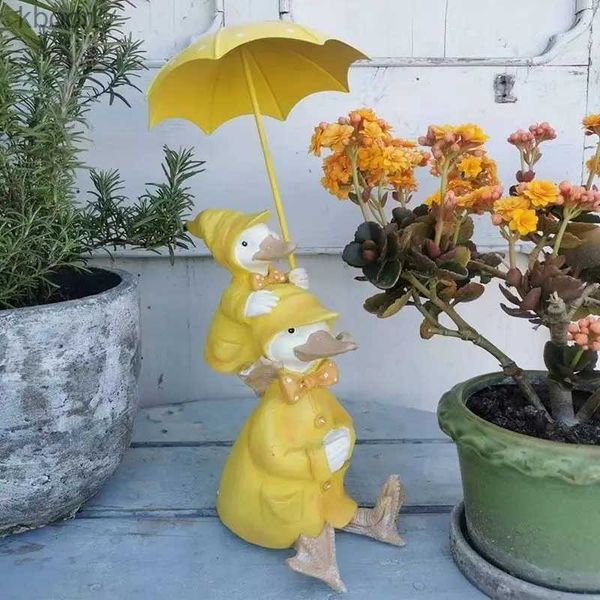 Decoraciones de jardín Cartoon paraguas de dibujos animados amarillos de pato amarillo