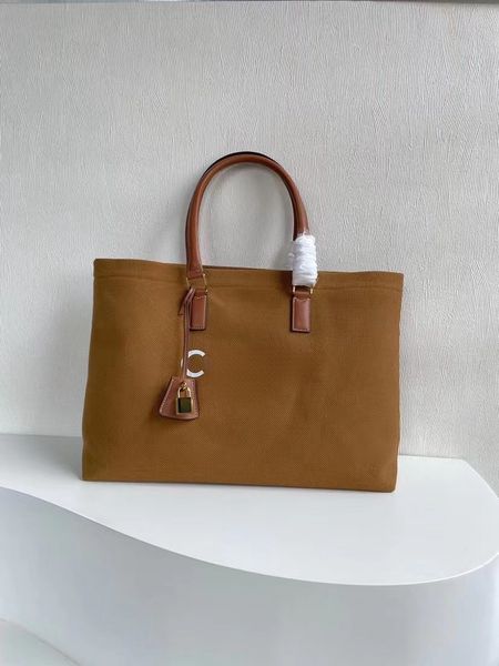 Bolsa de lona impressa e couro de bezerro, bolsa elegante para laptop, bolso interno com zíper, versátil bolsa de compras para viagens de curta distância Bolsa de designer de luxo HDMBAGS2023