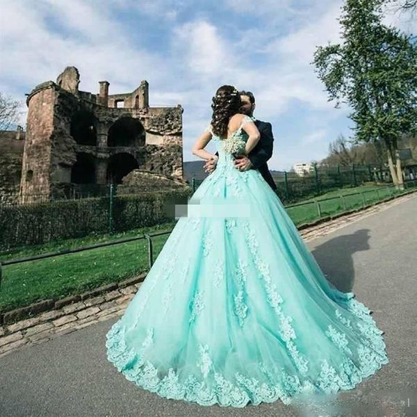 Abiti da ballo color menta Abiti Quinceanera con perle Abiti da ballo con applicazioni in pizzo Abiti da ballo per ragazze Abiti da ballo con lacci online344s