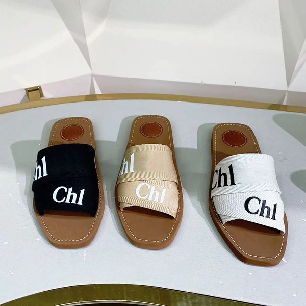 2024 novo designer tamancos chinelos slide verão viagem sandale senhora presente woody plana sandália sliders mulheres hotel lona casual sapato mocassim mens luxo preto branco mulas