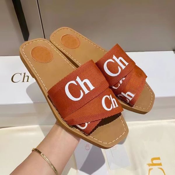 Dhgate Designer Sandal Man Woody Clog Mule plana sandale slides lotes de touz tazz slipper womans rosa chinelos vermelhos praia plataforma de lona shoe flop 572