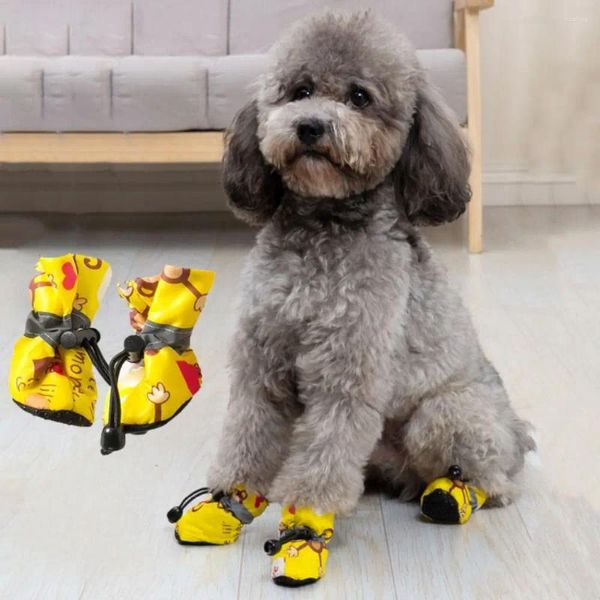 Vestuário para cães 4 unidades / conjunto fundo macio ao ar livre botas de chuva antiderrapantes ajustáveis quentes à prova d'água sapatos para animais de estimação capa de pé padrão de desenho animado