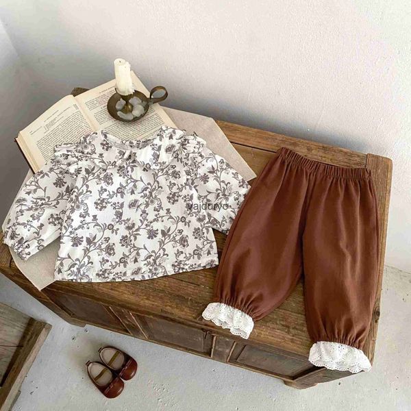 Conjuntos de roupas 2024 Spring Novo bebê menina de manga longa Conjunto de roupas infantil impressão de flor de flor tops + calça de renda 2pcs terno de crianças roupas H240508