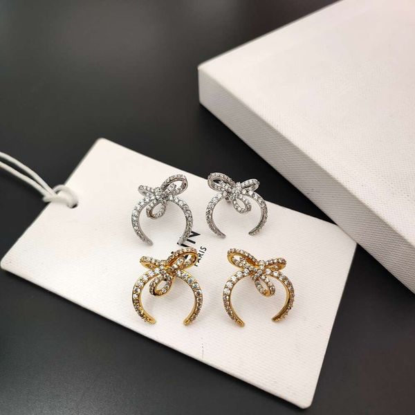 Marca de luxo jóias brincos cheio diamante alienígena arco brincos luz francesa moda