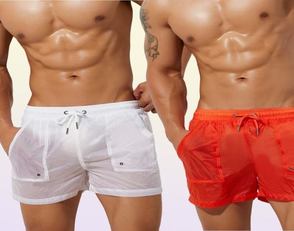 MEN039S Mesh Sheer Boxers Aracting See Boxers Şort Beraberlik Yüzme Sörf Gagaları Solun Giyim Pocke9202327