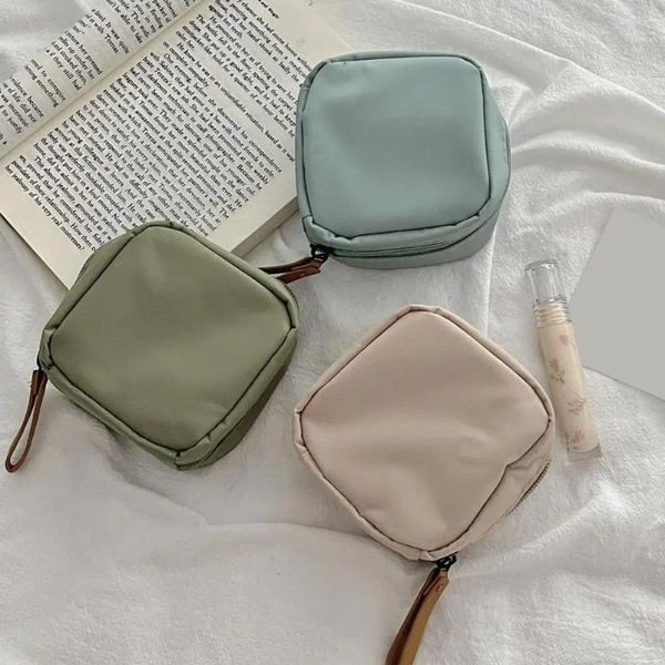 Sacos de armazenamento Bolsa de fecho de zíper Saco compacto Nylon com alça para fones de ouvido de batom Vendedores de pó