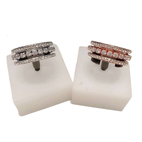 Anello Swarovski Designer Lusso Moda Donna Qualità originale Nuovo prodotto Romantico girevole Tre anelli con diamante pieno brillante Perlina di transito come regalo per la fidanzata