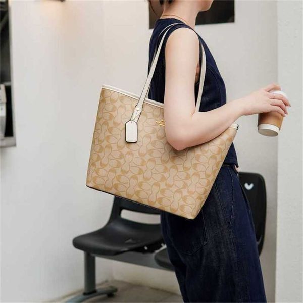 2023 Nuova borsa tote di grande capacità Borsa portatile classica per lo shopping leggera Borsa da lavoro per pendolarismo di fascia alta di lusso 70% di sconto sulla vendita online 80% di sconto sugli outlet