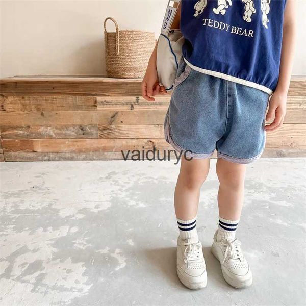 Shorts 2023 Nuovi cortometraggi di jeans di New Ldren Girls sciolti di cortometraggi casual per bambini Shorts Shorts Summer Shorts Shorts Fashion Case H240508