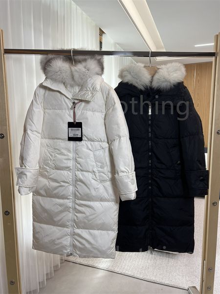 Piumino lungo da donna di stilista di lusso Parka nero Cappotto imbottito invernale Collo in pelliccia di volpe Cappello Piumino lungo Piumino con coulisse regolabile Cappotti invernali