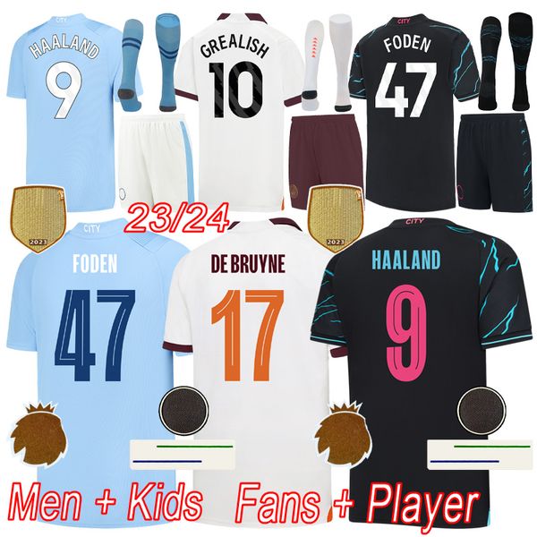 Man City Futbol Formaları Hayranlar ve Oyuncu Versiyonu 2024 Haaland de Bruyne Kids Futbol Forcu Kitleri Ev Erkekler Kiti Uzak Gömlek Üçüncü Gömlek 23 24 Camiseta Futbol Maillot Ayak