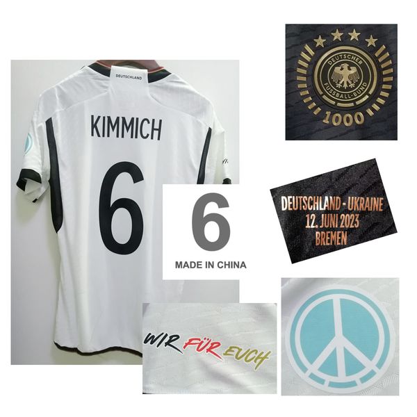 Artigos têxteis Matchworn Player Issue 2023 ALEMANHA 1000º aniversário dos jogos Maillot SANE KIMMICH Haverz Ferro de transferência de calor no emblema de patch de futebol