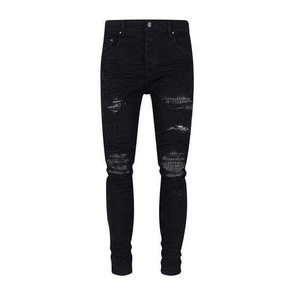 Jeans da uomo Set toro nero alla moda da uomo con lavaggio elastico a diamante traforato e pantaloni lunghi da donna American High Street Instagram