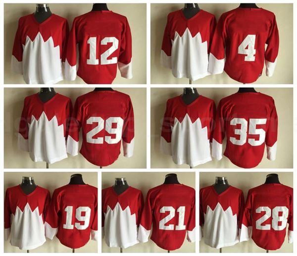 Uomo Hockey su ghiaccio 1972 Retror 21 Maglia STAN MIKITA 28 BOBBY CLARKE 29 KEN DRYDEN 35 TONY ESPOSITO YVAN COURNOYER Cucita Rosso Bianco3035225