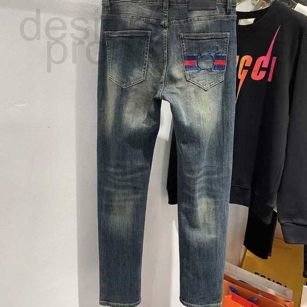 Jeans masculinos designer designer 2023 jeans para homens outono / inverno alto luxo simples marca de moda europeia elástica slim fit pequenos pés puro algodão denim calças top