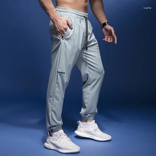 Pantaloni da uomo 2024 Sport da uomo che corrono con tasche con cerniera Pantaloni sportivi da allenamento per il calcio Pantaloni da jogging Pantaloni sportivi da fitness