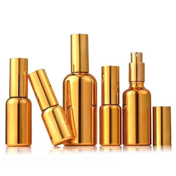 Verpackungsflaschen Großhandel 100 ml Goldpumpe Kosmetisches Glas Ätherisches Öl pro Flaschen mit Spray für Körperpflege Drop Delivery Office S Otcvn