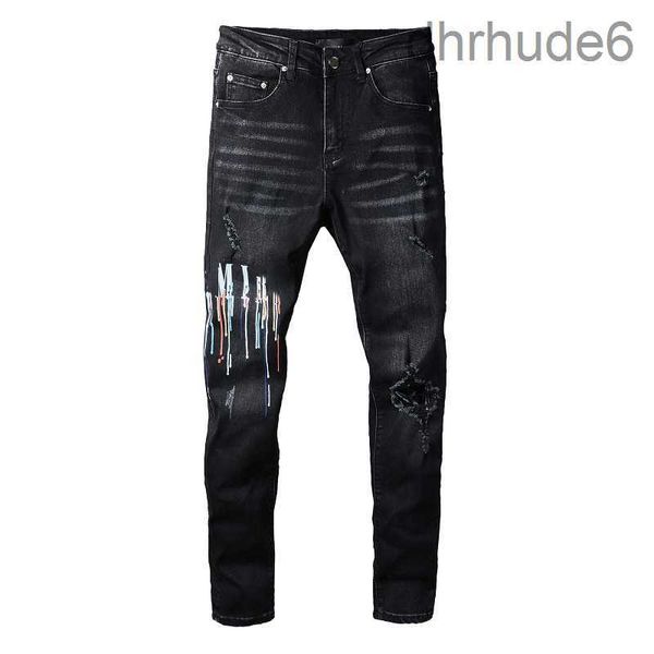 Jeans da uomo Pantaloni firmati con ricamo di lettera di alta qualità Pantaloni alla moda con fori per strada Hip Hop Taglia 28-40 KUDW