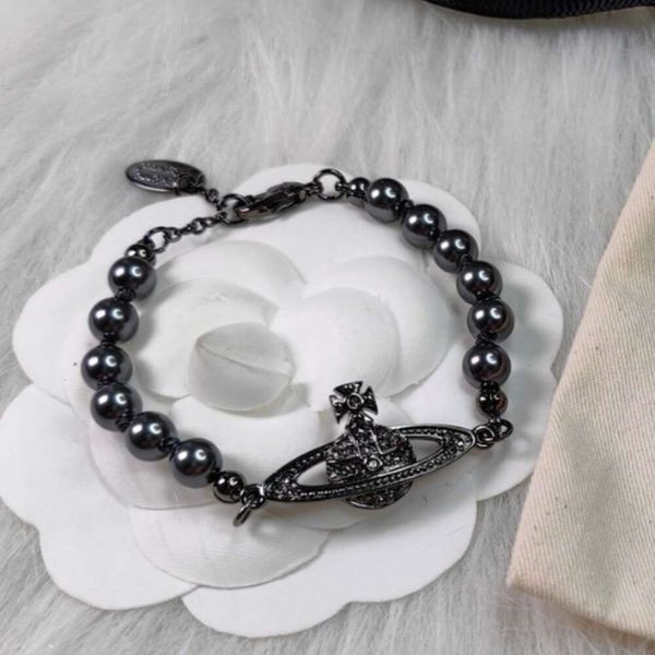 Designerin Viviane Westwoods Vivienen High Version Western Empress Dowager Gun Black Saturn Pearl Necklace Armband-Set Cool Plating Black Saturn Necklace 5561