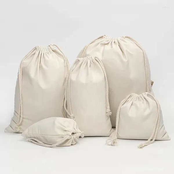 Alışveriş çantaları 100pcs özel pamuk tuval brawstring hediye çantası çantası Çevre dostu depolama bakkal giysi çocuklar için