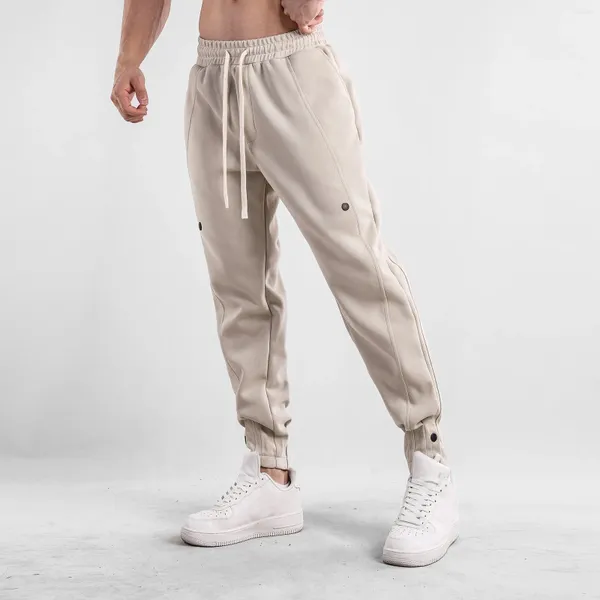 Pantaloni da uomo Pantaloni sportivi alla moda con design a bottoni pieghettati Gambe dei pantaloni Tinta unita Coulisse Doppia tasca Abbigliamento casual quotidiano