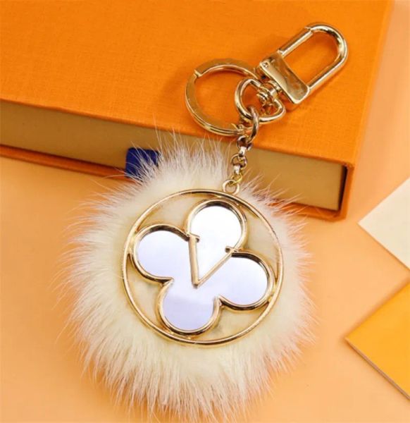 Portachiavi con specchio a forma di fiore di design Portachiavi con motivo a cuore in rame fatto a mano Portachiavi per auto portatili Borsa con ciondolo Decorazione Accessori pendenti con palla di pelo di moda