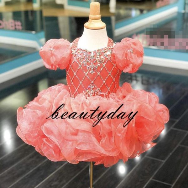 Vestidos del desfile de las muchachas coralinas 2020 Nuevos niños pequeños Vestido de fiesta Glitz Vestido de niña de las flores Bodas con cuentas Cupcake drapeado Tamaño 3 5 7 9231z