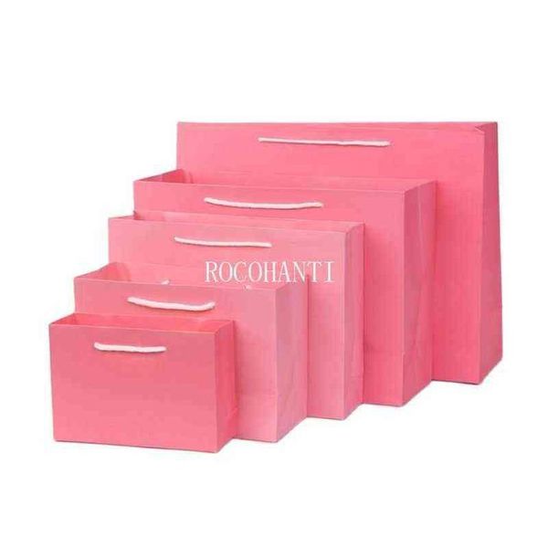 Confezione regalo 50X Sacchetto di carta Kraft pesante personalizzato Colore rosa Negozio di Natale per sacchetti di imballaggio per abiti H1231 Consegna a domicilio Gard Dhi98