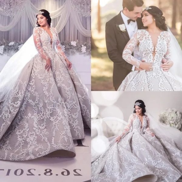 Stunningbride 2024 Abito da ballo in pizzo Dubai Abiti da sposa Manica lunga Applicazioni in pizzo Arabia Saudita Abiti da sposa Abito da sposa con scollatura profonda trasparente