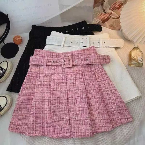 Gonne per bambini Ragazze Gonne a pieghe rosa Gonne di cotone in tweed Bambini Abiti casual autunnali Stile coreano Gonne bianche a trapezio Gonne scolastiche