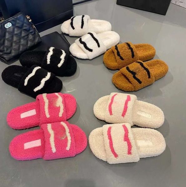 Chinelos de alta qualidade Woolskin Sheepskin Palmilha Slides Sandálias Flat Slipper Designers Mulheres Soft Winter Luxury Plush Fur Oran Borracha Sole 114