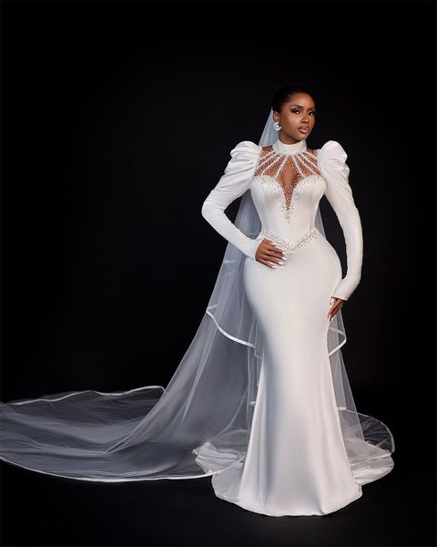 Arabo Aso Ebi Vintage 2024 Africa Bianco Sirena Abiti da sposa per la sposa Collo alto Manica lunga a sbuffo Vedere Attraverso Perline Giardino Macchia Abiti da sposa musulmani