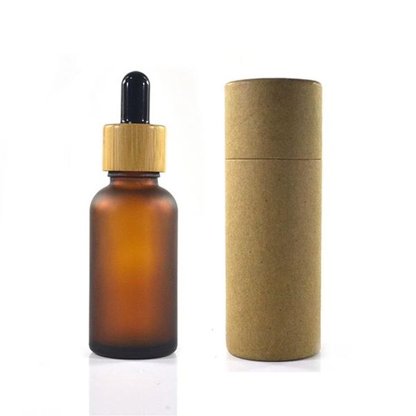 Bottiglia di vetro ambrato satinato da 100 pezzi da 30 ml con tappo in bambù con contagocce in scala di imballaggio in tubo di carta300P