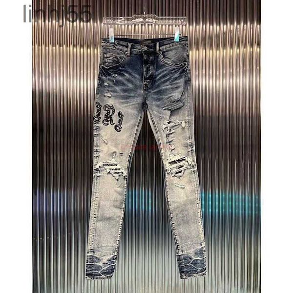 Jeans masculinos roupas de designer amires calças jeans amies nova marca de moda azul profundo high street caju flor remendo buraco embro1ypj