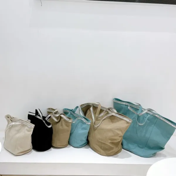 Akşam çantaları 2024 moda markası düz renk büyük kapasiteli tuval kadınlar için bir omuz bayanlar nedensel çanta boş zaman alışveriş çantası