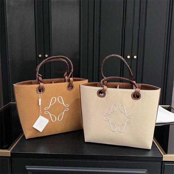 HOT Le Canvas Tote Bag Trançado Handle Designer Handbag Woven Handle Tote Bag Design Totes Mulheres Shopping Beach Bag Grande Capacidade Bolsas de Ombro 231214