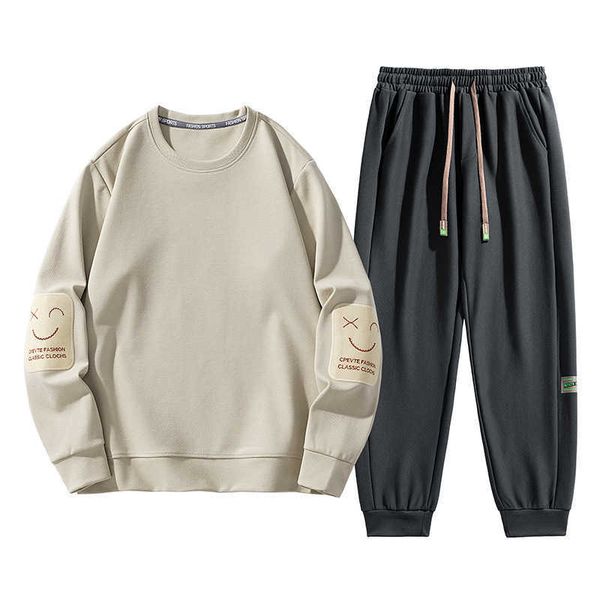 Felpe con cappuccio da uomo Felpe Ampio set sportivo casual da uomo in primavera e autunno girocollo con cappuccio e pantaloni con viso sorridente set in due pezzi set alla moda in cotone perlato